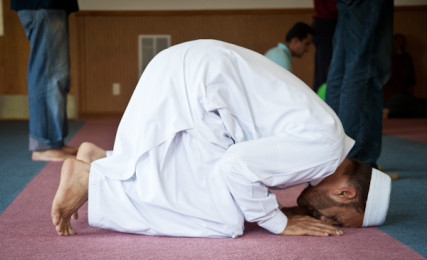 Aburghani prays toward the direction of Kabah in Mecca during 1:30 prayer at the Islamic Society of Greater Kansas City on Tuesday afternoon, June 26, 2012.  RNS photo by Sally Morrow