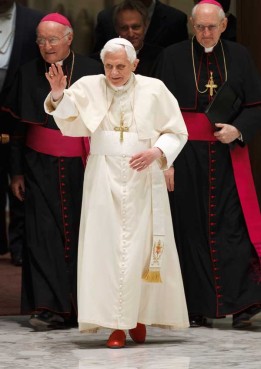 Pope Benedict XVI waves as he arrives to lead his general audience in Paul VI hall at the Vatican Feb. 8. RNS photo by Paul Haring/Catholic News Service