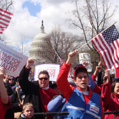 (RNS) Supports of gay marriage rally outside the U.S. Supreme Court as justices heard a challenge to the 1996 Defense of Marriage Act. RNS photo by Kevin Eckstrom.